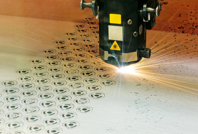 Laser cutting.